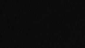 Eddy Reynoso y Canelo Álvarez conversan durante una rueda de prensa.