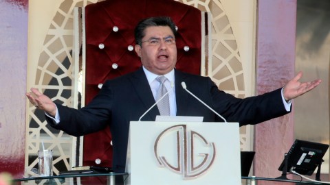 FILE - Naasón Joaquín García leads a service at his church "La Luz del Mundo" in Guadalajara, Mexico on Aug. 9, 2018. (AP Photo/File)