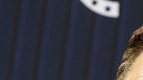 Charlie Kirk y Sean Strickland.