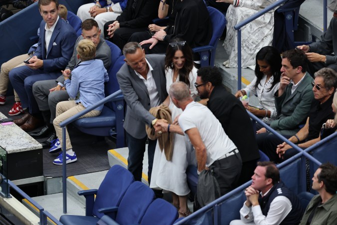 Bruce Springsteen y Sting se saludan en el palco presidencial del Arthur Ashe.