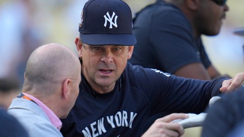 Aaron Boone y Brian Cashman.