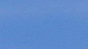 El Departamento de Seguridad Nacional y las banderas estadounidenses ondean afuera de la oficina regional del Servicio de Inmigración y Control de Aduanas de Estados Unidos (ICE), el martes 16 de septiembre de 2025, en Burlington, Massachusetts.