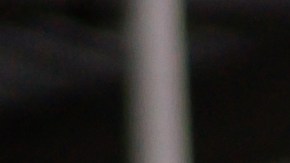 Salesman greeting with a handshake a happy Latin American family interested in buying a car at the dealership - car ownership concepts