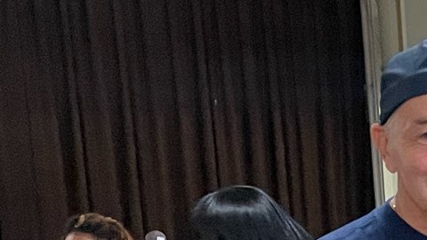 Antonio J. Fernández, CEO de Catholic Charities of New York, Carmen Reyes de Catholic Charities Community Services, junto a Kenya Taveras el padre Michael of St. Simon Stock–St. Joseph.