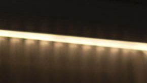 El consejero delegado del Atlético de Madrid Miguel Ángel Gil (i), y el presidente del equipo, Enrique Cerezo (c), posan junto a Robert Givone (d), socio de Apollo y co-gestor de ASC Apollo Sports Capital.