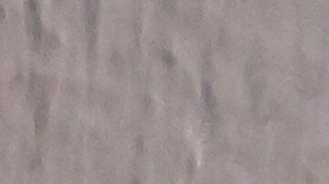 Un beneficiario del HEAP, ajusta el termostato mientras vigila el nivel de combustible con la esperanza de tener suficiente para superar el cierre.