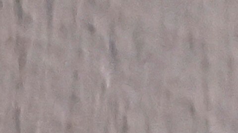 Un beneficiario del HEAP, ajusta el termostato mientras vigila el nivel de combustible con la esperanza de tener suficiente para superar el cierre.