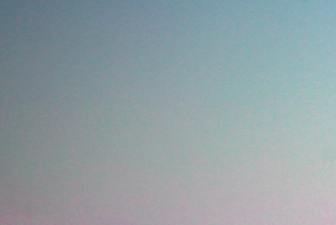 Vista del atardecer desde UNICO 20°105° en Riviera Nayarit, con piscinas, palmeras y el océano al fondo.