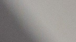 Latin American senior woman at home holding a package and checking an app on her cell phone - lifestyle concepts