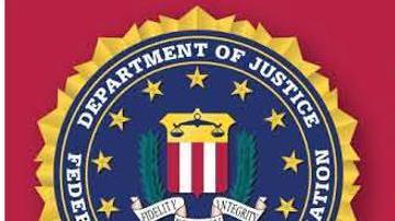 Imagen cedida por el FBI del cartel de búsqueda del sospechoso del tiroteo en la Universidad de Brown este martes, en Providence, Rhode Island (EE.UU.).