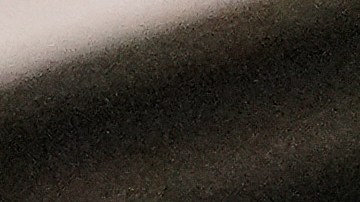 Agentes de Aduanas y Patrulla Fronteriza interrogan a los ocupantes de un vehículo que detuvieron durante una operación antimigratoria.