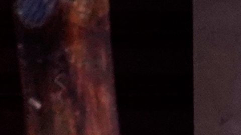 El cuerpo del futbolista asesinado Mario Pineida yace en el suelo de una carnicería en Guayaquil, Ecuador, el miércoles.