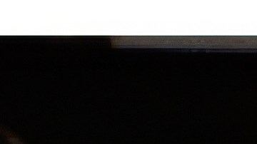 Esta foto, publicada por el Departamento de Justicia de EE. UU., muestra un escritorio con un cajón abierto y fotografías, documentadas el 6 de julio de 2019, durante un registro en la casa de Jeffrey Epstein en Nueva York.