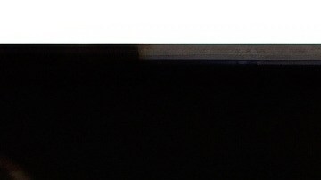 Esta foto, publicada por el Departamento de Justicia de EE. UU., muestra un escritorio con un cajón abierto y fotografías, documentadas el 6 de julio de 2019, durante un registro en la casa de Jeffrey Epstein en Nueva York.