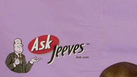 Isaiah Rider sosteniendo jersey de los Lakers.