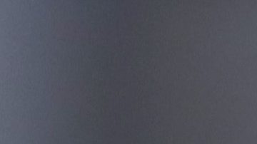 Michael Annett junto a su auto durante una práctica de la NASCAR Xfinity Series.