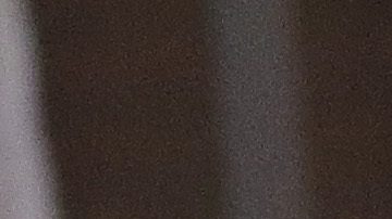 Canelo Álvarez, a la derecha, rodea con su mano al entrenador Eddy Reynoso.