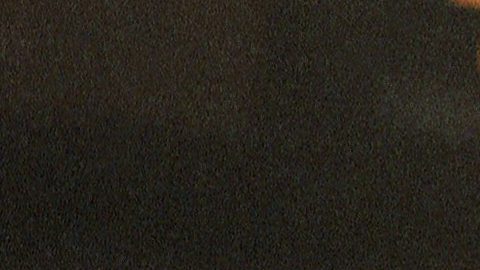 George Foreman, a la izquierda, golpea a Michael Moorer.