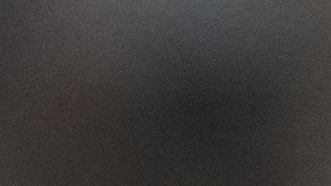 Tottenham's Cristian Romero passes the trophy during the medal ceremony after the UEFA Super Cup soccer match between Paris Saint-Germain and Tottenham Hotspur in Udine, Italy, Wednesday, Aug. 13, 2025. (AP Photo/Antonio Calanni)