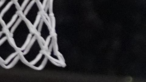 New York Knicks' Jalen Brunson, right, drives past Brooklyn Nets' Nolan Traore, center, as Cam Thomas, left, watches during the first half of an NBA basketball game Wednesday, Jan. 21, 2026, in New York. (AP Photo/Frank Franklin II)
