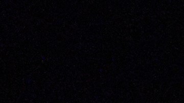 Personas sostienen fotografías durante una vigilia en memoria de Alex Pretti, quien fue asesinado a tiros por agentes federales de inmigración en Minneapolis, el miércoles 28 de enero de 2026.