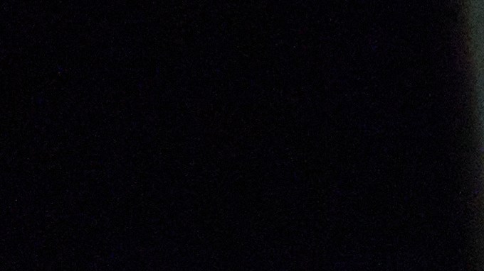 Personas sostienen fotografías durante una vigilia en memoria de Alex Pretti, quien fue asesinado a tiros por agentes federales de inmigración en Minneapolis, el miércoles 28 de enero de 2026.