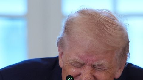 Donald Trump y John Harbaugh.