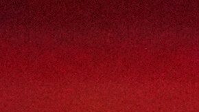 Un balón atraviesa la canasta durante la práctica de un partido de baloncesto.