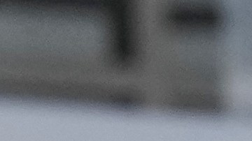 El comandante de la Patrulla Fronteriza de EE. UU., Gregory Bovino, grita a los manifestantes el domingo 11 de enero de 2026 en Minneapolis.