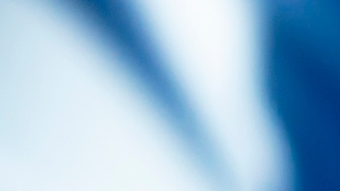 Close,Up,On,Businessman,Holding,A,Wooden,Block,With,The