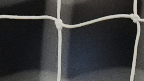 Aston Villa's goalkeeper Emiliano Martinez reacts during the Champions League quarterfinal first leg soccer match between Paris Saint-Germain and Aston Villa at Parc des Princes stadium in Paris, Wednesday, April 9, 2025. (AP Photo/Thibault Camus)