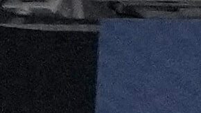 Workers prepare the field at the Santiago Bernabeu stadium ahead of an NFL game between the Miami Dolphins and Washington Commanders in Madrid, Spain, Friday, Nov. 14, 2025. (AP Photo/Steve Luciano)