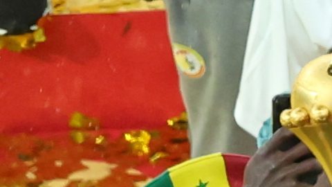 FILE - Senegal's Sadio Mane holds the trophy aloft as he celebrates with teammates after winning the Africa Cup of Nations final soccer match between Senegal and Morocco in Rabat, Morocco, Sunday, Jan. 18, 2026. (AP Photo/Youssef Loulidi, File)