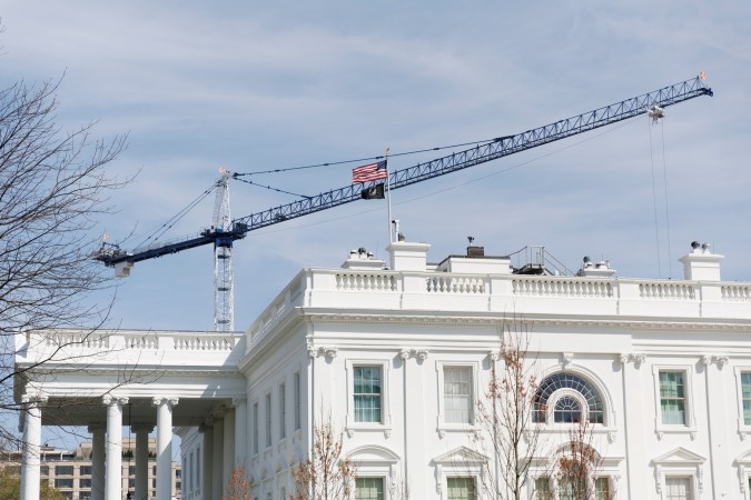 A tower crane being used for construction of the White House Ballroom are seen at the White House, on Tuesday, March 31, 2026, in Washington. (AP Photo/Tom Brenner)