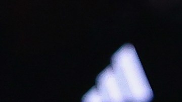 Atlanta Hawks forward Jalen Johnson, left, blocks a shot from New York Knicks center Karl-Anthony Towns (32) while forward Onyeka Okongwu (17) defends during the second half in Game 3 of a first-round NBA playoffs basketball series, Thursday, April 23, 2026, in Atlanta. (AP Photo/Colin Hubbard)