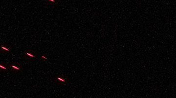 Un cartel de WrestleMania cuelga sobre la multitud durante un evento de la WWE.