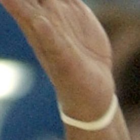 FILE - In this Sept. 4, 2002 file photo, Puerto Rico's Jose Ortiz waves to the crowd following their 89-87 double-overtime win over Angola during the second preliminary round at the World Basketball Championships in Indianapolis. Ortiz has been arrested in Puerto Rico after federal agents say they seized 218 marijuana plants and 40 rounds of assault-rifle ammunition at his house. Ortiz was charged Thursday, June 30, 2011, with possession with intent to distribute the plants. It was not immediately clear if he had a lawyer. (AP Photo/Darron Cummings, File)