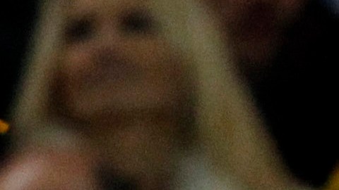 Spain's Andres Iniesta, second from right, holds up the World Cup trophy as team members celebrate at the end of the World Cup final soccer match between the Netherlands and Spain at Soccer City in Johannesburg, South Africa, Sunday, July 11, 2010. Spain won 1-0. (AP Photo/Bernat Armangue)