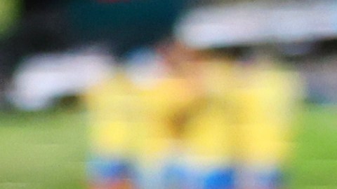 Colombia's Luis Díaz, center, celebrates with teammate James Rodríguez (10) after he scored during the second half of an international friendly soccer match against Australia, Tuesday, Nov. 18, 2025, in New York. (AP Photo/Heather Khalifa)