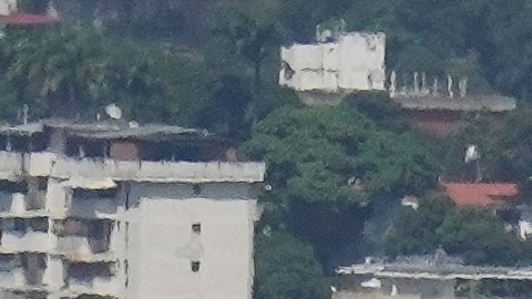 La sede del Servicio Nacional de Inteligencia (SEBIN) de Venezuela, conocida como El Helicoide, se alza frente al barrio La Cota 905 en Caracas, Venezuela, el sábado 27 de julio de 2024.