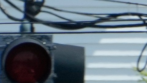 Un vehículo es transportado en una plataforma cerca del lugar de un tiroteo en el que estuvo involucrado el Servicio de Inmigración y Control de Aduanas de Estados Unidos, el lunes 13 de julio de 2026 en Biddeford, Maine.
