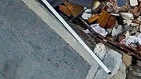 Se puede ver la señal SOS en edificios derrumbados tras los dos terremotos que sacudieron Caraballeda el 24 de junio, en el estado de La Guaira, Venezuela, el jueves 2 de julio de 2026.