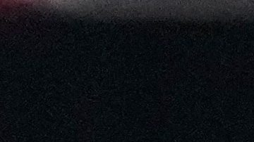 El argentino Giovani Lo Celso sostiene una pancarta con la frase "Las Malvinas son argentinas" mientras su compañero Nicolás Otamendi le hace un gesto.