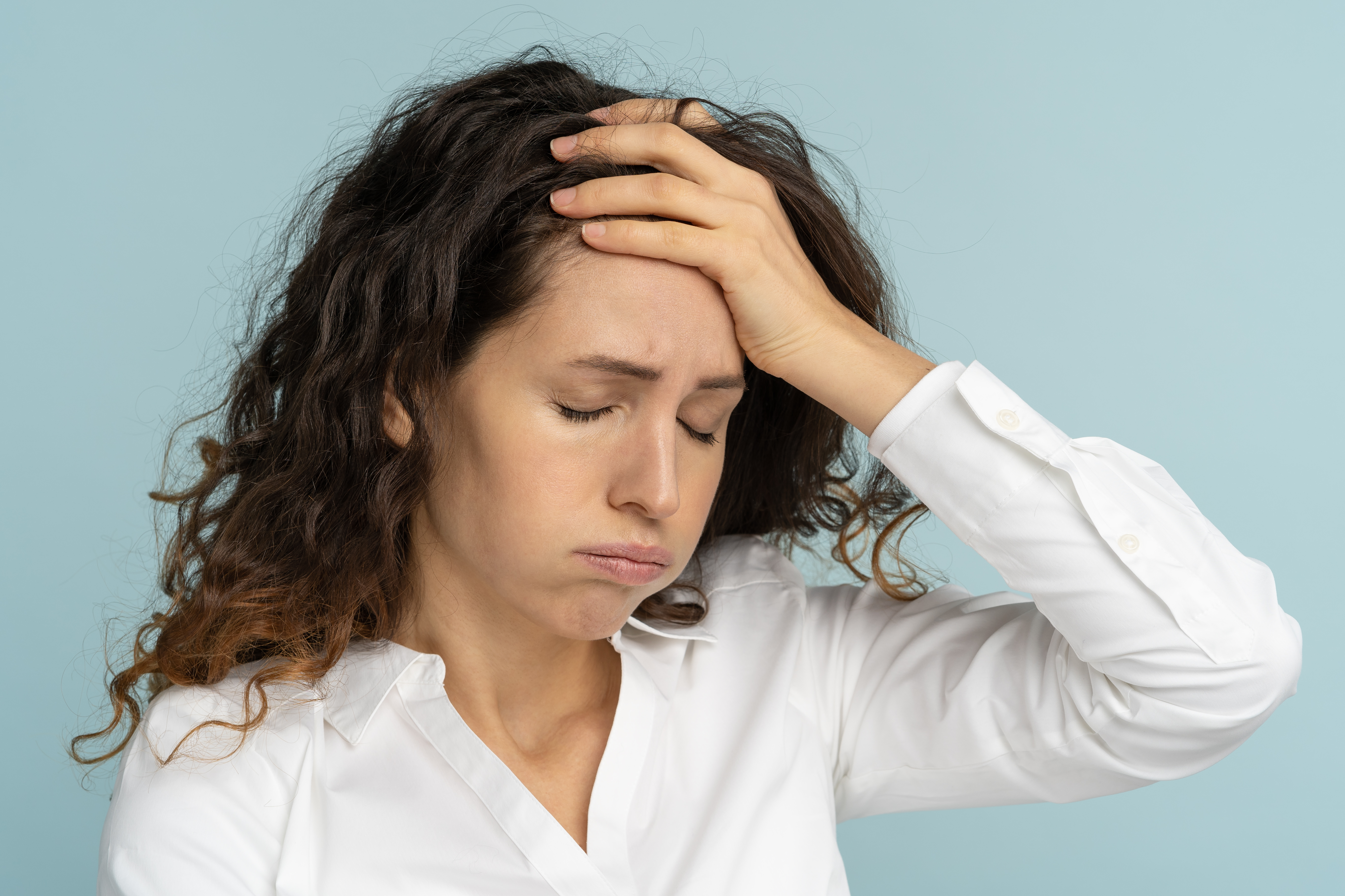 Qué sucede en tu cuerpo cuando suspiras: es mucho más que botar aire