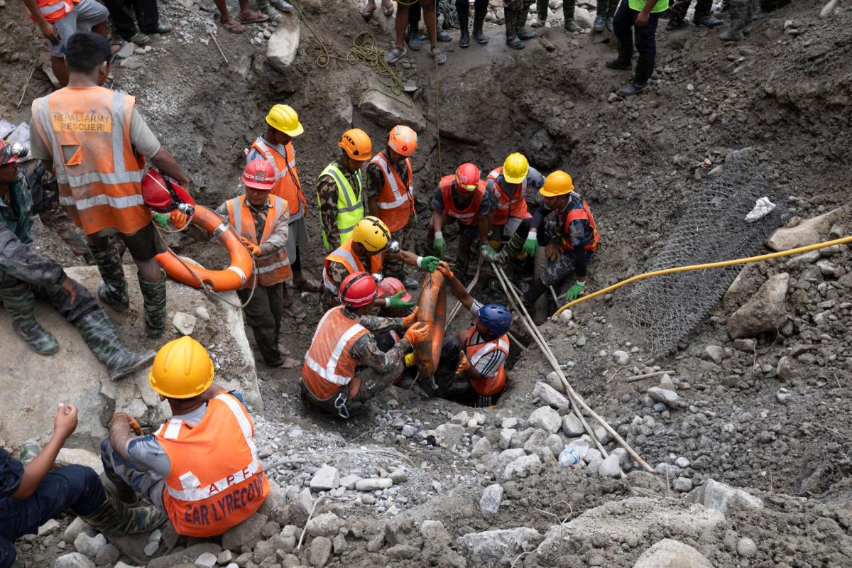 Two workers were rescued alive after nine days trapped under avalanche debris in Nepal