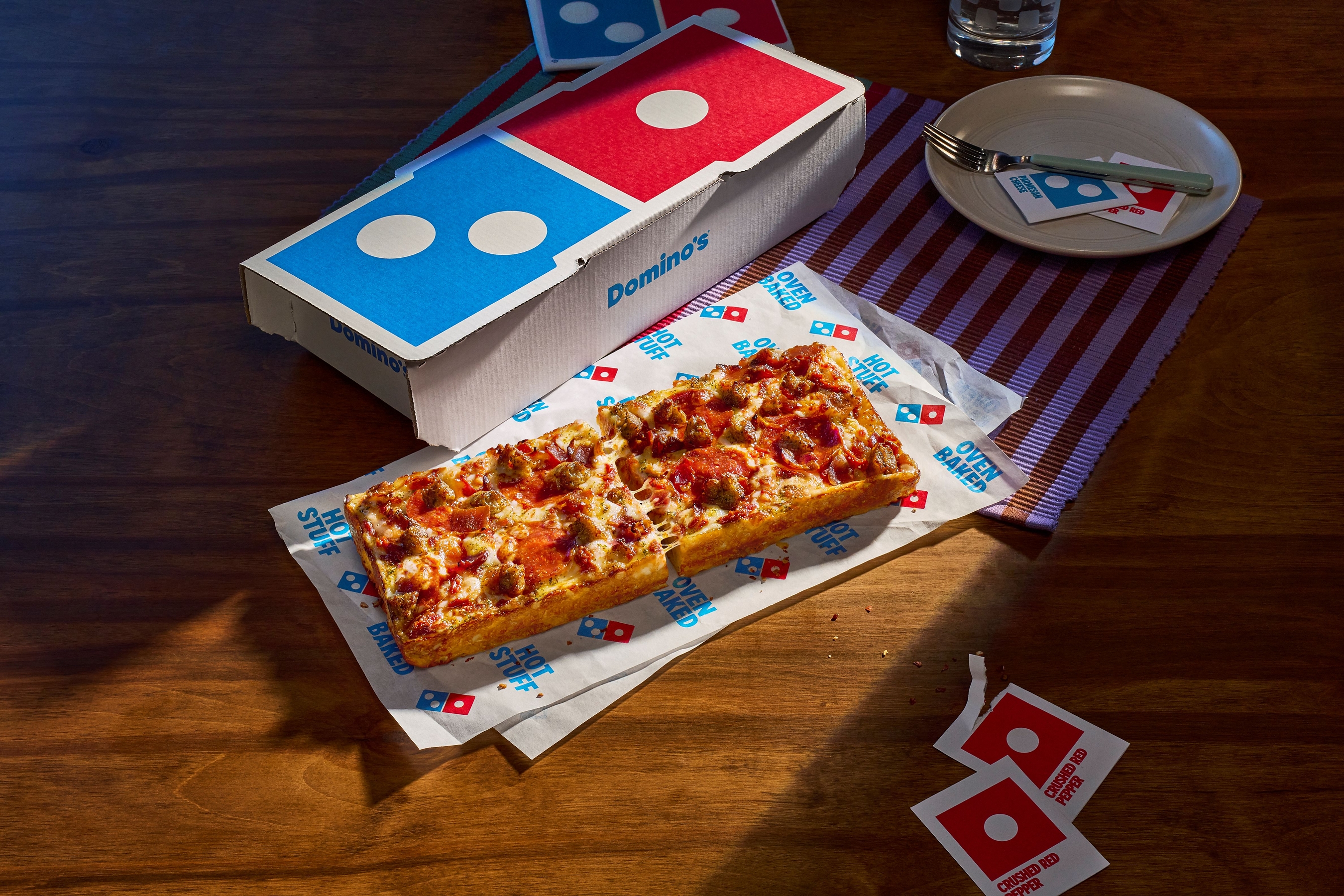 Domino’s regala pizza a quienes compren en McDonald’s, Burger King y otros restaurantes